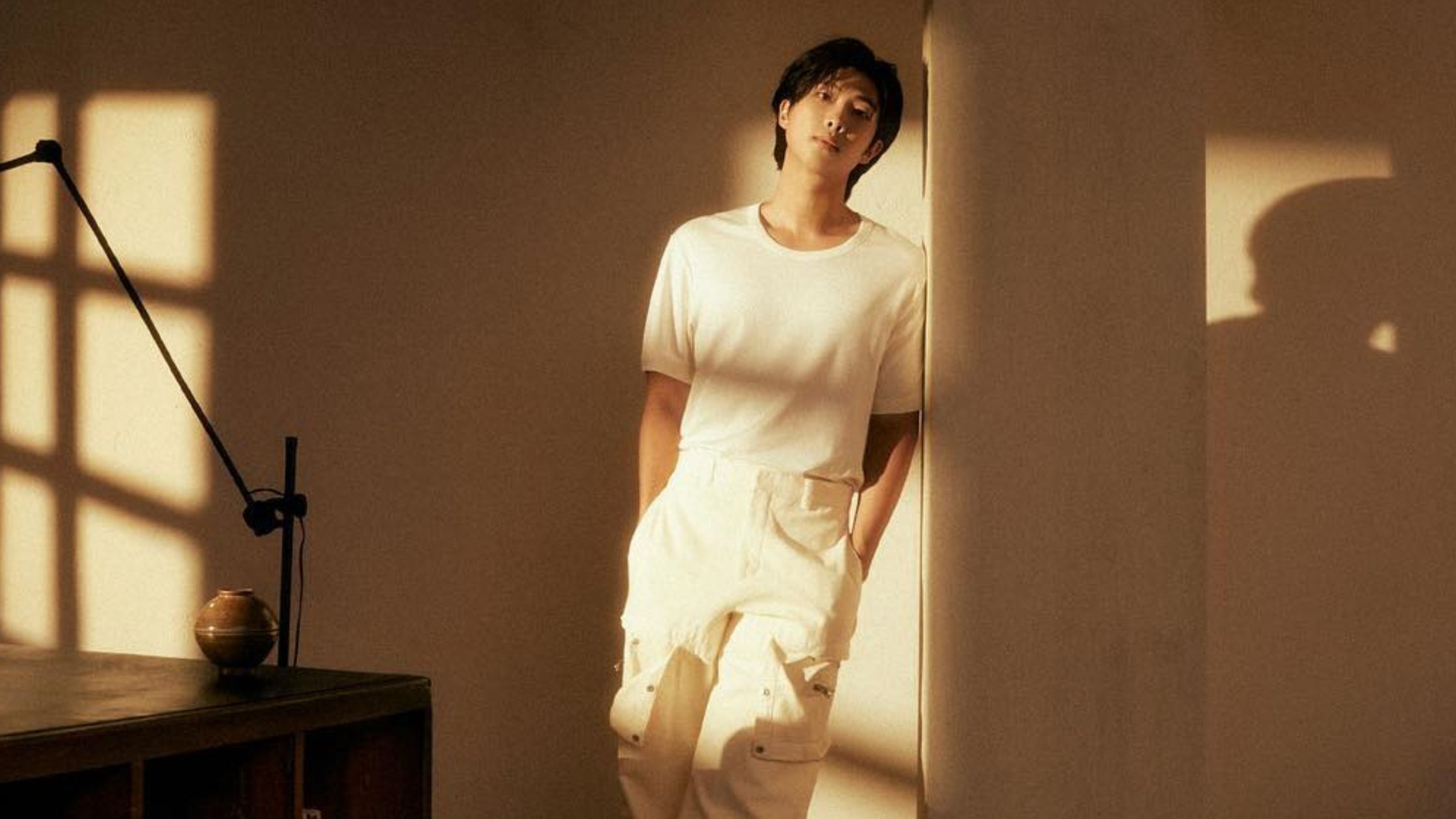 An image of RM wearing white clothes. 