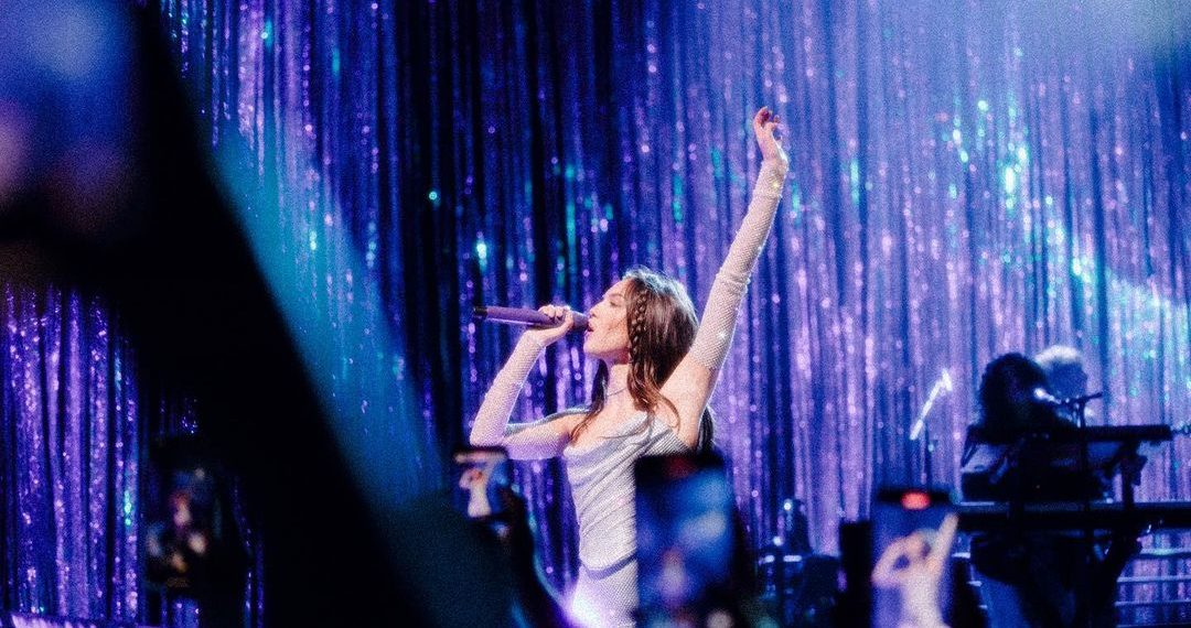 Olivia performing on stage