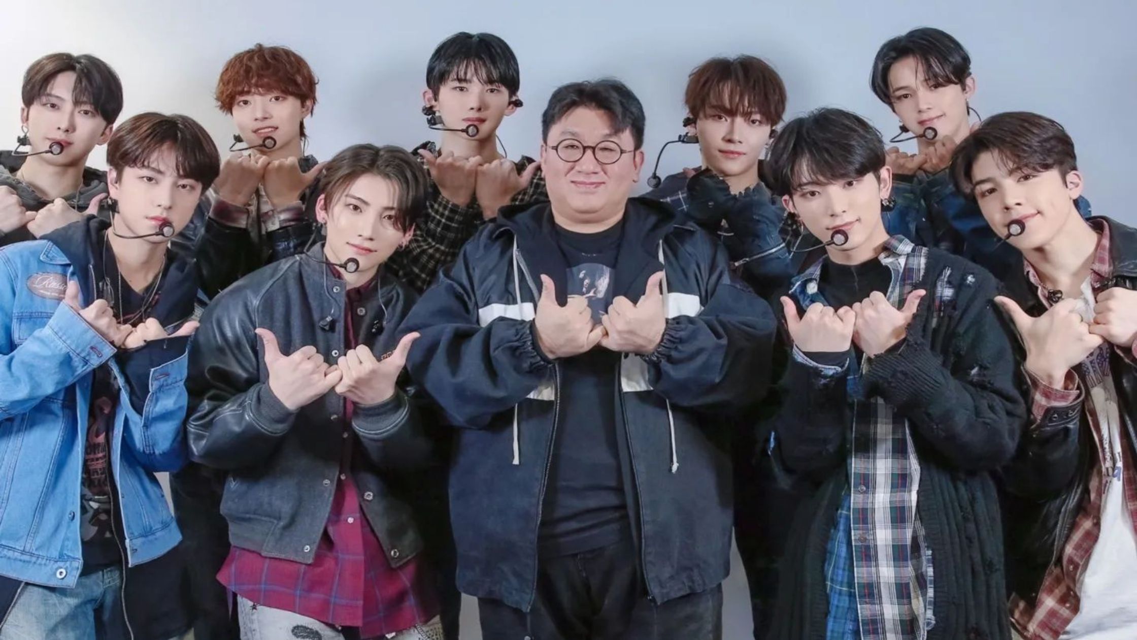 Bang Si-hyuk with members of TXT.