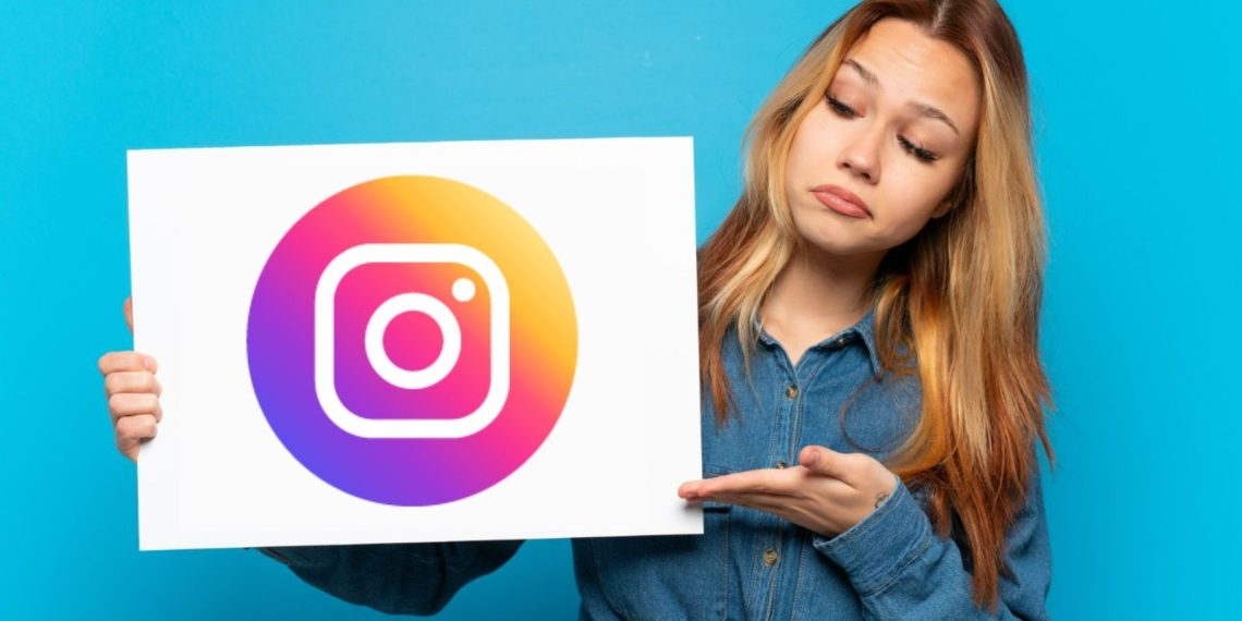 a women holding instagram banner