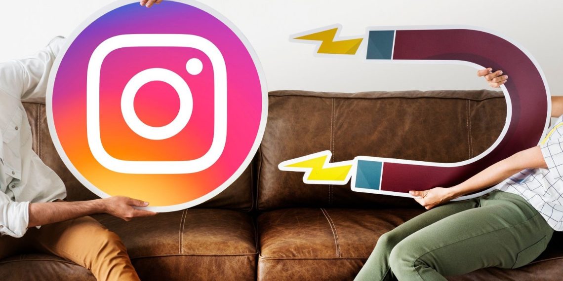 People holding an Instagram icon