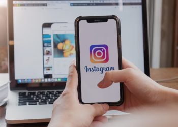 A girl taking picture on her Instagram camera.