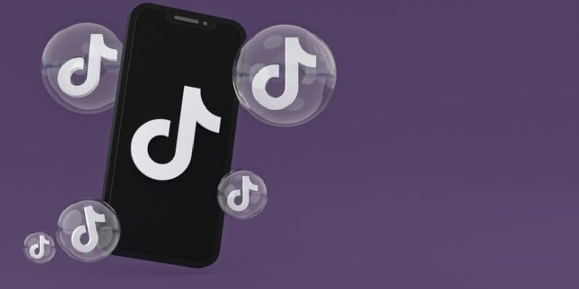 TikTok logo on a phone