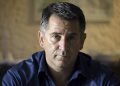 Anthony Lapaglia wearing a blue shirt and looking straight in camera.