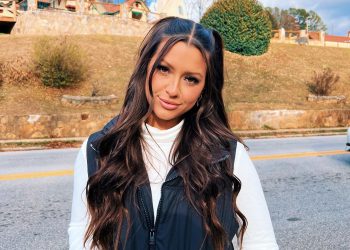 Whitney Wren wearing white and black clothes.